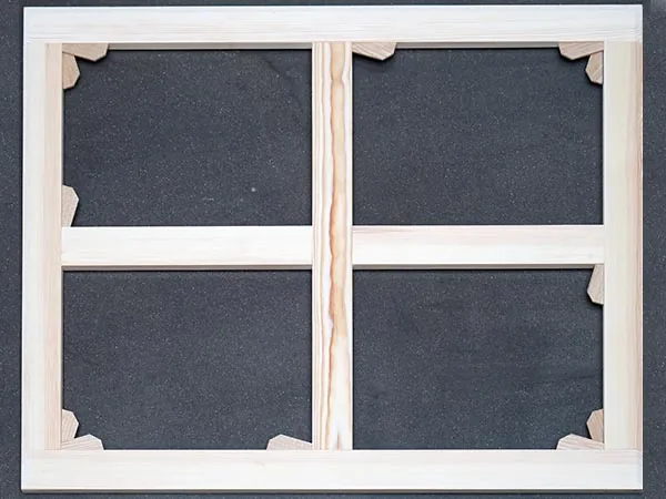 A standard handmade stretcher frame with cross-bracing and hardwood corner keys